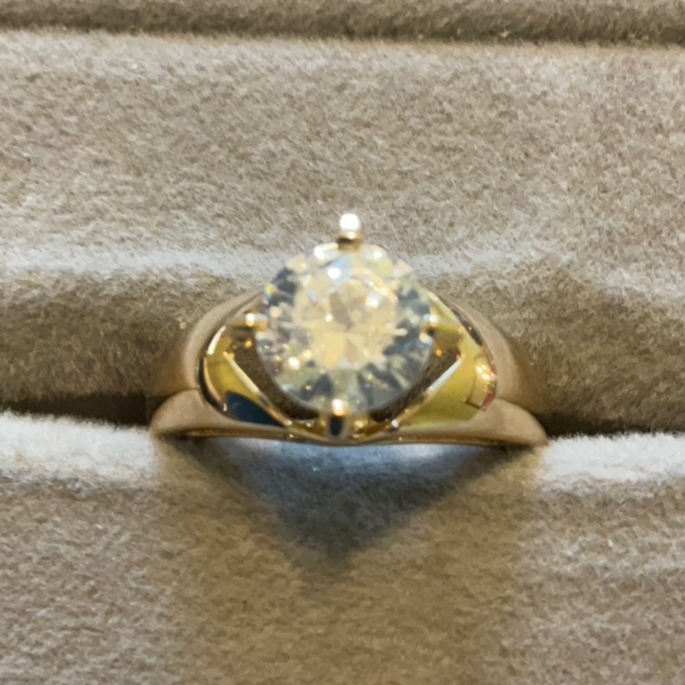 Elegant Gold Toned Sterling Silver Ring with Clear Stone